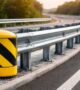 Highway safety barrier at dusk